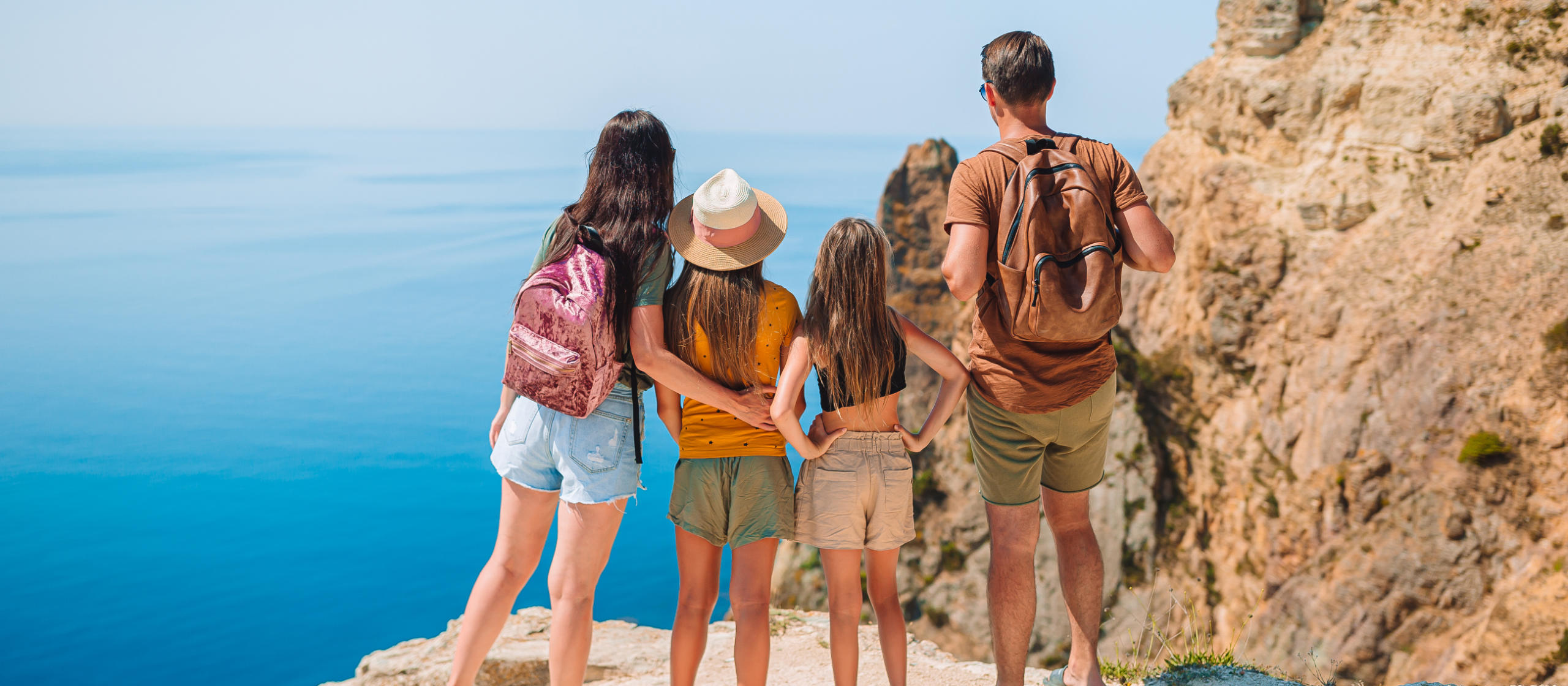 Happy family on vacation in the mountains
