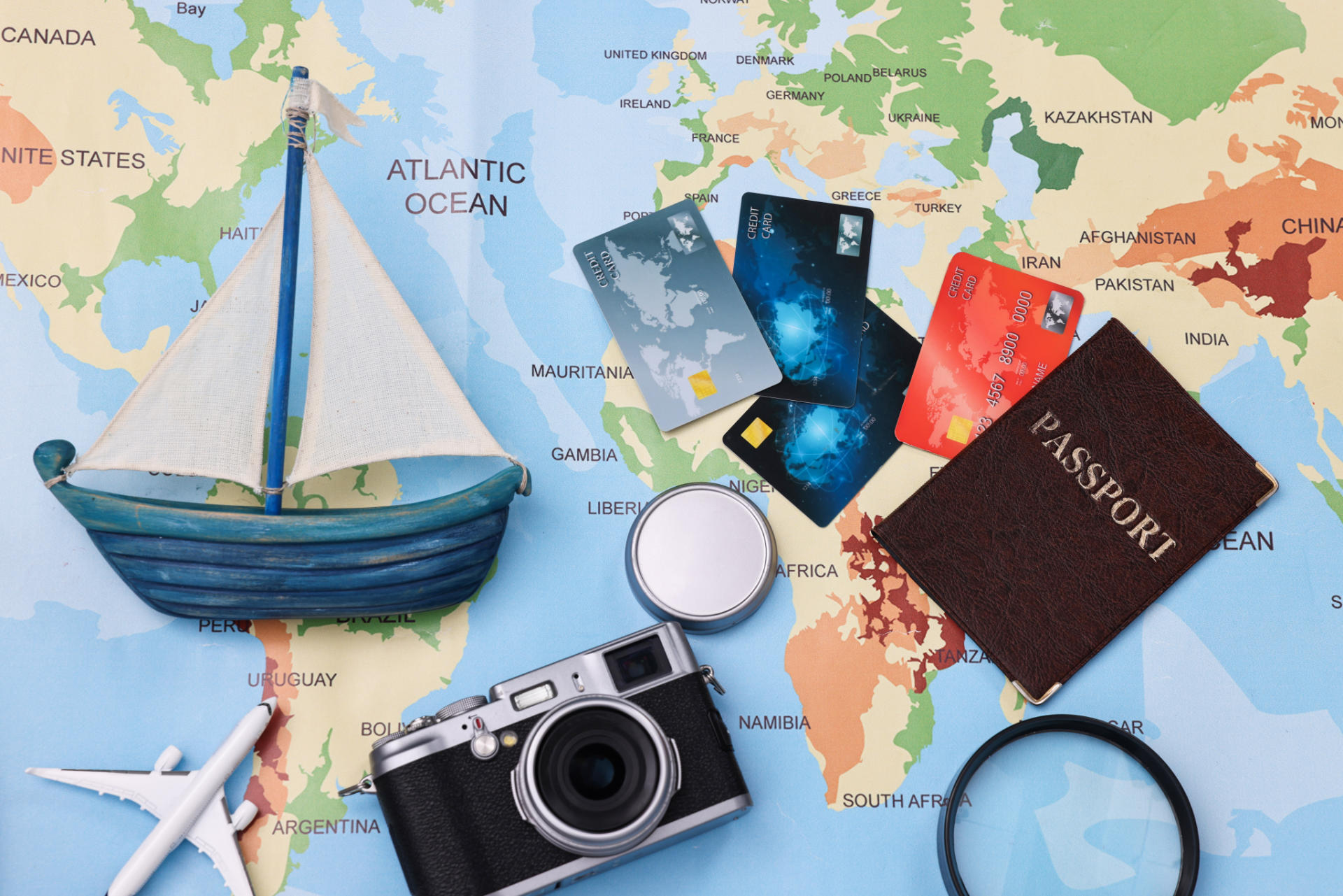Travel blogger. Flat lay composition with vintage camera and map